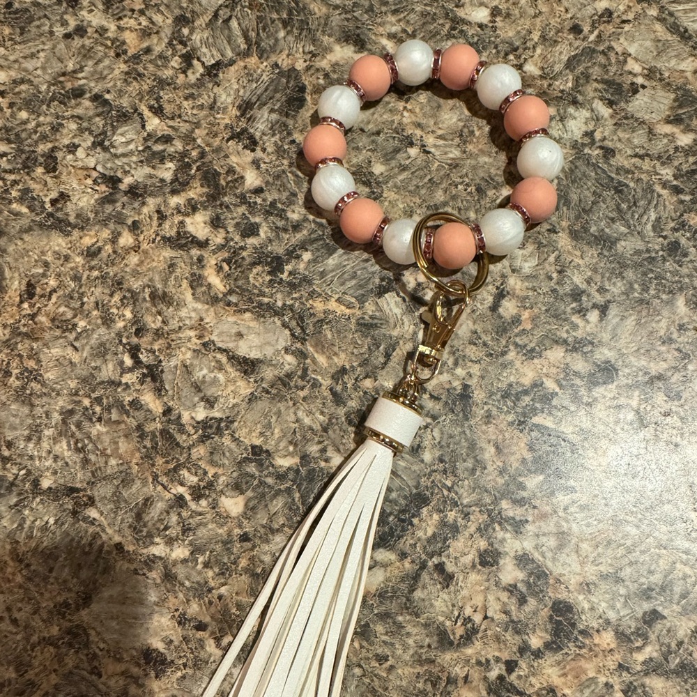 Cream beaded wristlet